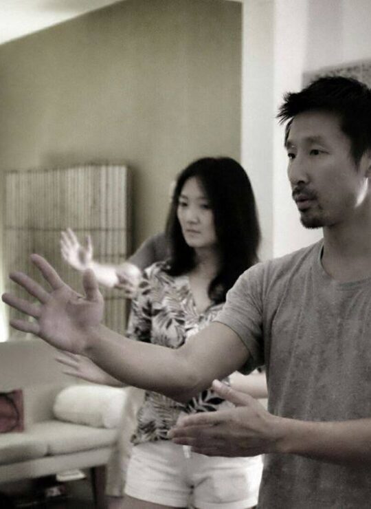 Corporate employees engaged in a dynamic group fitness class by DBD Health Hub, promoting physical wellness, teamwork, and workplace energy through expert-led sessions