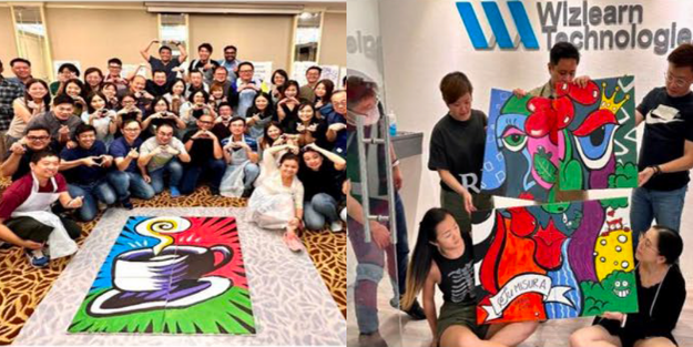DBD HUB corporate wellness customised team building activity in Singapore featuring employees participating in the Paint Our Masterpiece challenge to build teamwork, communication, collaboration, and strategic planning skills by creating a large group artwork together.